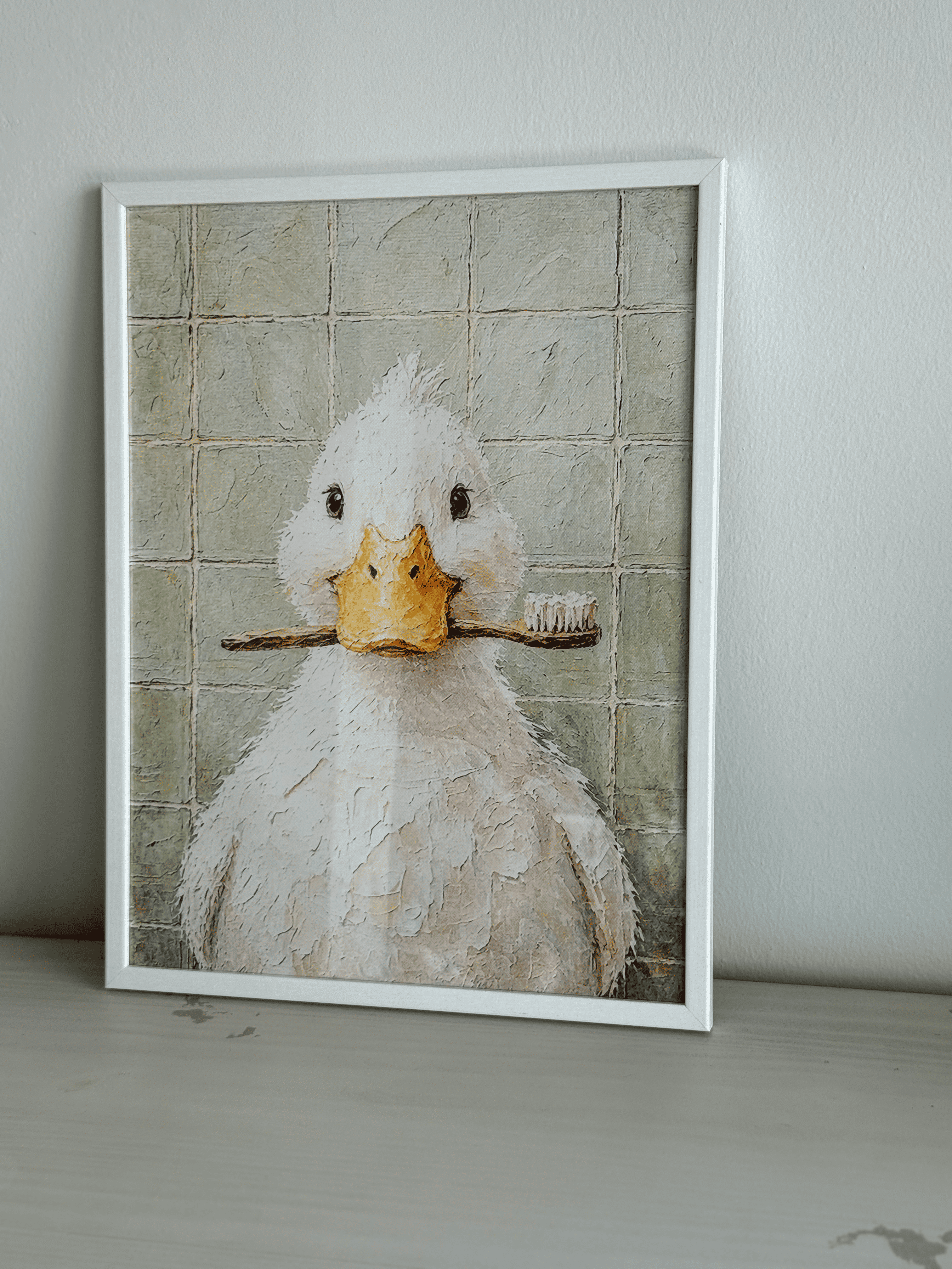 Cuadro de patito con cepillo dientes